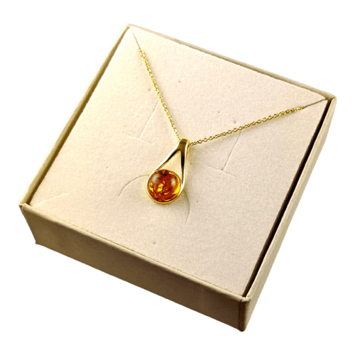 Wisiorek złoty z koniakowym bursztynem - delikatny - srebro pozłacane