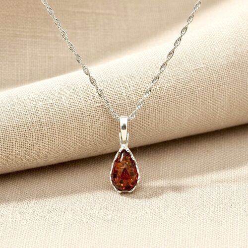 Wisiorek srebrny z koniakowym bursztynem - koronkowy