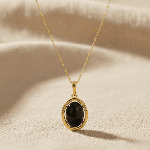 WISIOREK ZŁOTY Z ONYKSEM SREBRO POZŁACANE 925