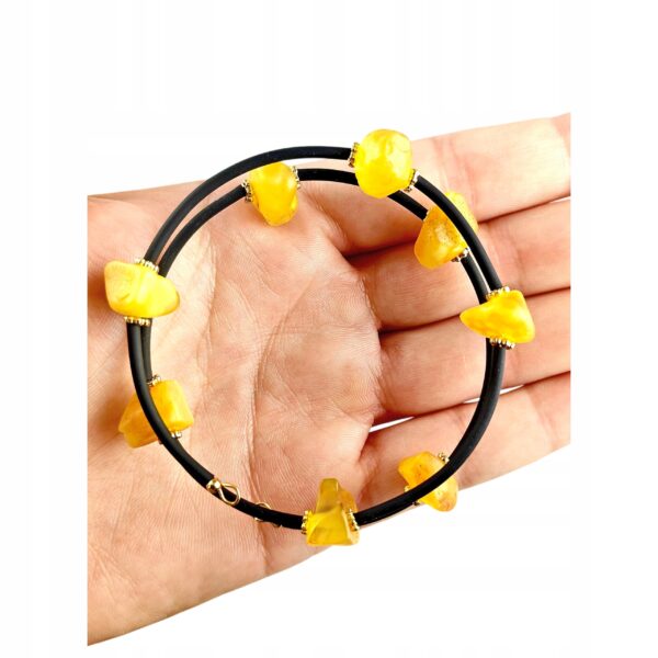 00cb16a46ee02efa2396ff1bbfaa1000.jpg Bransoletka złota ze stali z certyfikowanym bursztynem - regulowana