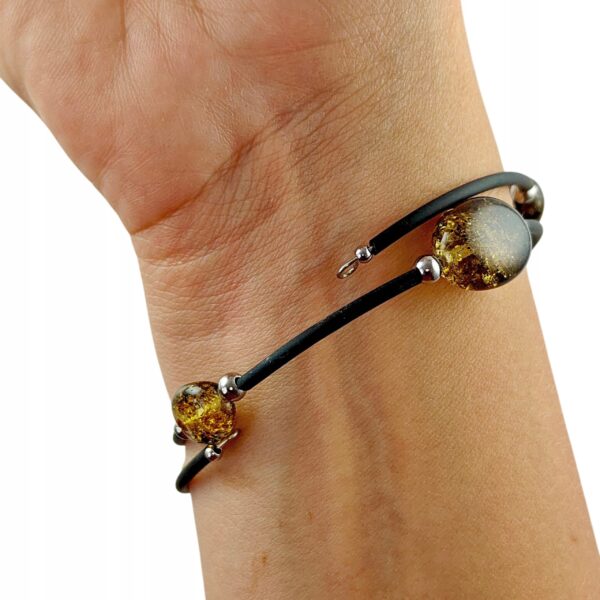 0da24c6d2e6f8b4cb25fcf07a116528c.jpg Bransoletka srebrna ze stali z certyfikowanym bursztynem - regulowana