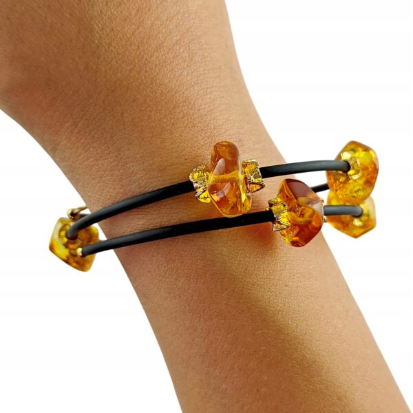 1b7d03167de197c56a3938dd90114225.jpg Bransoletka złota ze stali z certyfikowanym bursztynem - regulowana