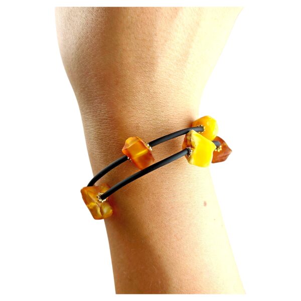 345809d2aaa2f7c763fcf357aa9ef645.jpg Bransoletka złota ze stali z certyfikowanym bursztynem - regulowana