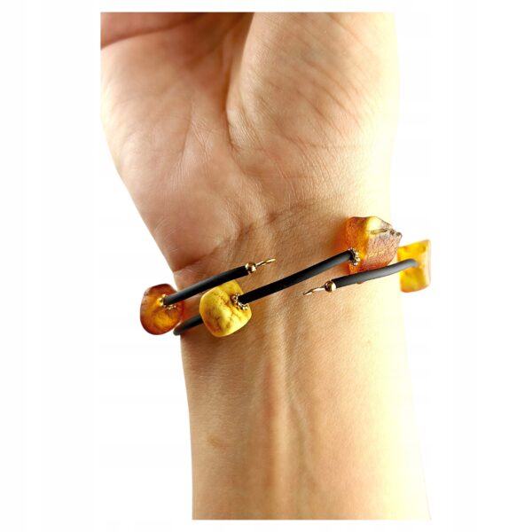 4104a57290f9e9871ca38e73cee2fd09.jpg Bransoletka złota ze stali z certyfikowanym bursztynem - regulowana