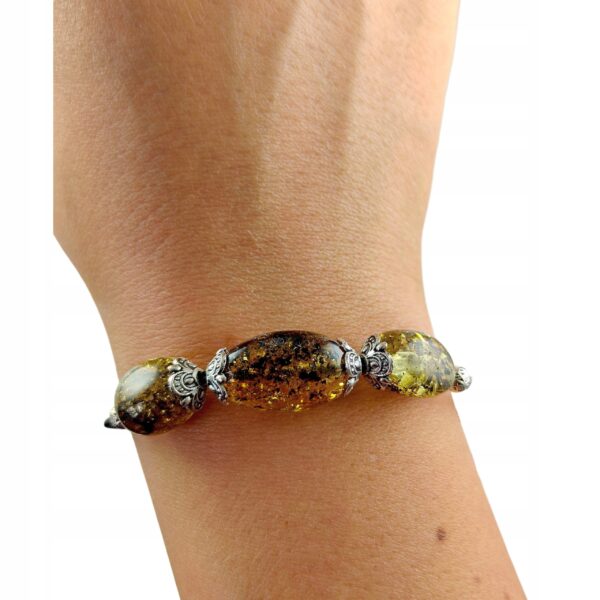 445ba1c03dd852fdfe6be1a4ad79a0cc.jpg Bransoletka srebrna ze stali z certyfikowanym bursztynem - regulowana