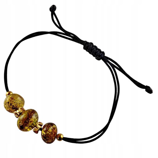 4860cb81194b11ec0d58344831ce5a72.jpg Bransoletka złota ze stali z certyfikowanym bursztynem - regulowana