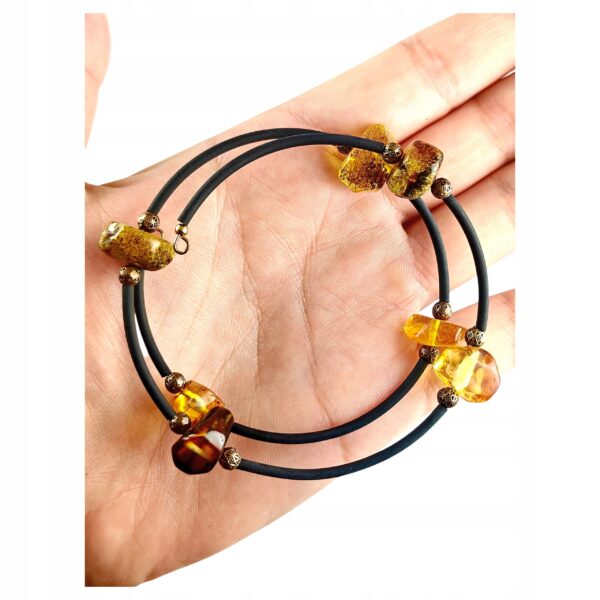 4fd26ce64b1dd9f2b37ac39fb7db4f36.jpg Bransoletka srebrna ze stali z certyfikowanym bursztynem - regulowana