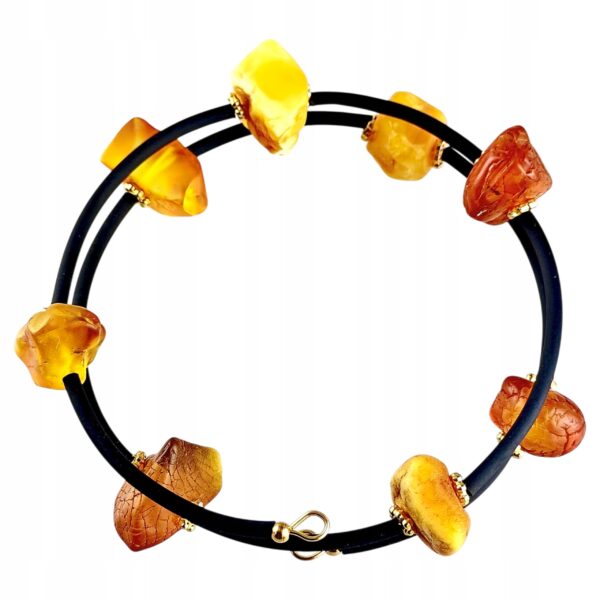 5d09b0b0f2f18bb32771ab5118e4c62b.jpg Bransoletka złota ze stali z certyfikowanym bursztynem - regulowana