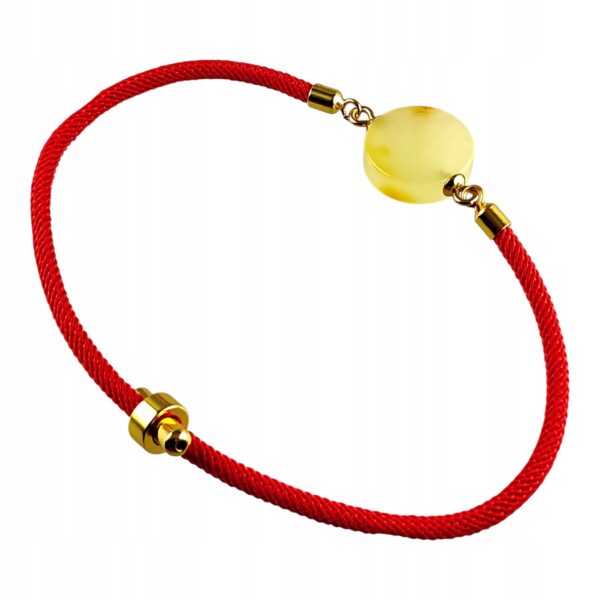 69d55da9064bc9ce1e3347b32b340cce.jpg Bransoletka na sznurku z naturalnym mlecznym bursztynem - regulowana