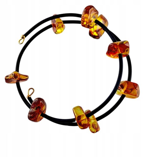 72c0cca5c0ed3fe82bd3c6894000da9a.jpg Bransoletka złota ze stali z certyfikowanym bursztynem - regulowana