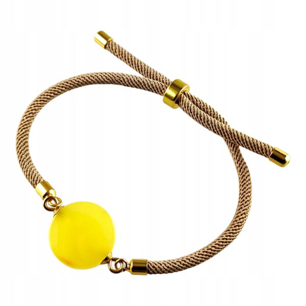 73b3645e035cf6f4e2988e6f0910bdf9.jpg Bransoletka na sznurku z naturalnym mlecznym bursztynem - regulowana