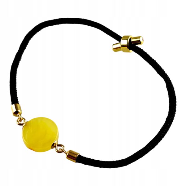 7ca4d3a036f951f88740621f87e60709.jpg Bransoletka na sznurku z naturalnym mlecznym bursztynem - regulowana