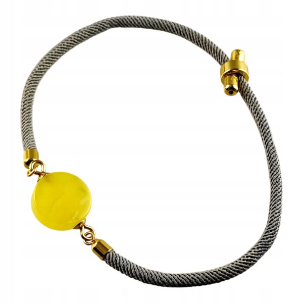 86d42d60c89f54e746dfe1c8349e54cd.jpg Bransoletka na sznurku z naturalnym mlecznym bursztynem - regulowana