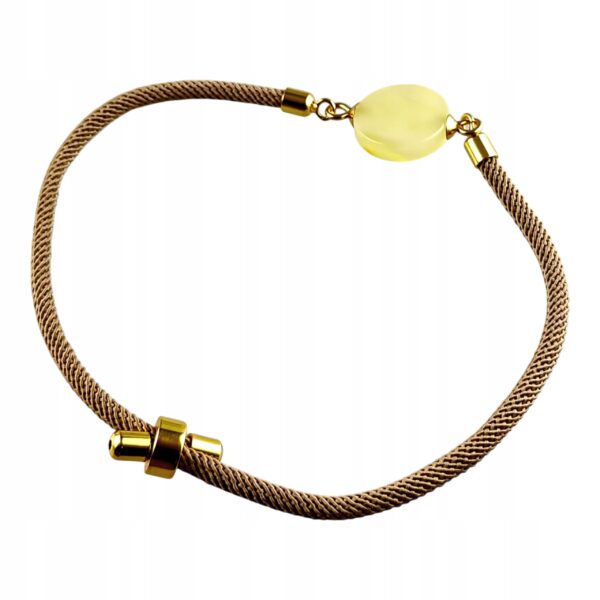 988009f5c8d73a502a37eada59d0fc75.jpg Bransoletka na sznurku z naturalnym mlecznym bursztynem - regulowana