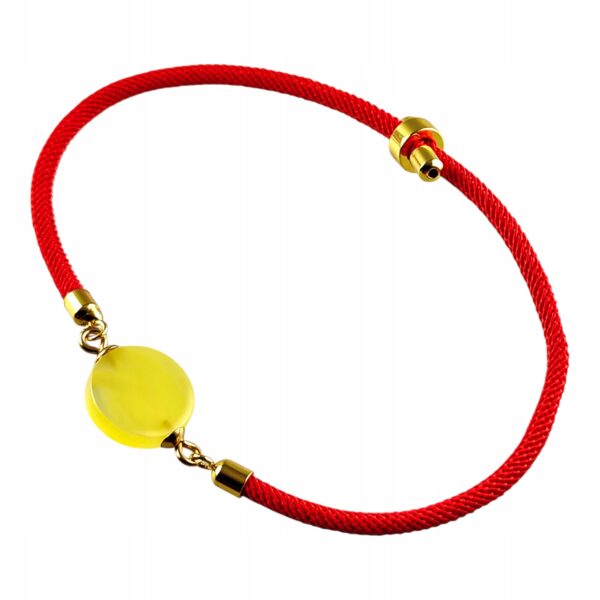 9b78ec58bbdb450c24edef1e268291e4.jpg Bransoletka na sznurku z naturalnym mlecznym bursztynem - regulowana