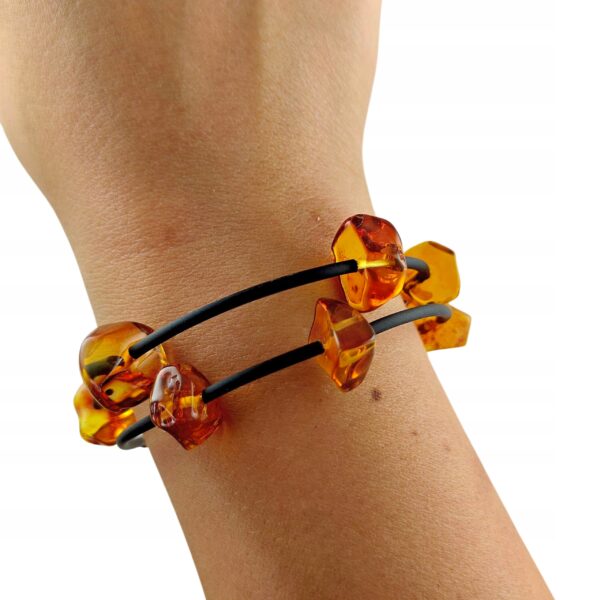 a59fd7e0130381d457747c7483d97940.jpg Bransoletka złota ze stali z certyfikowanym bursztynem - regulowana