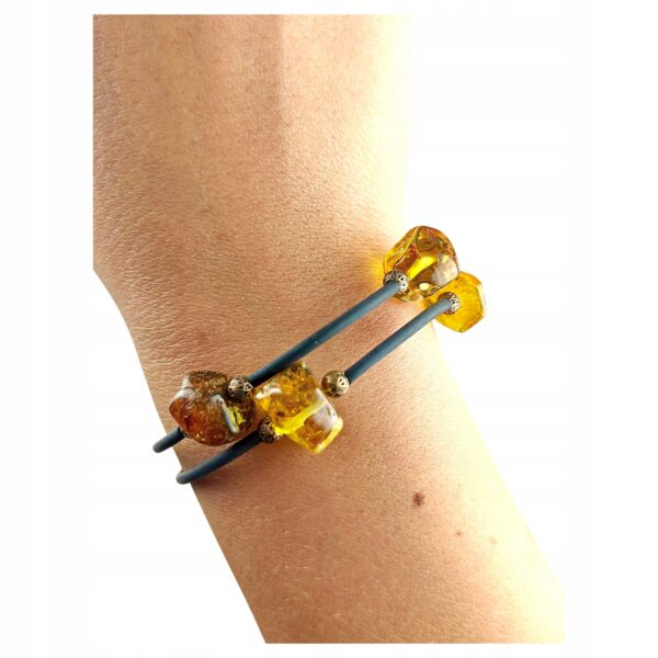 a6efb0b17ac07352c9091d0e885d3c16.jpg Bransoletka srebrna ze stali z certyfikowanym bursztynem - regulowana