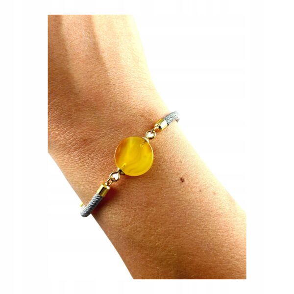 cd44eb6137e82fb589e97c5cef0f87a8.jpg Bransoletka na sznurku z naturalnym mlecznym bursztynem - regulowana