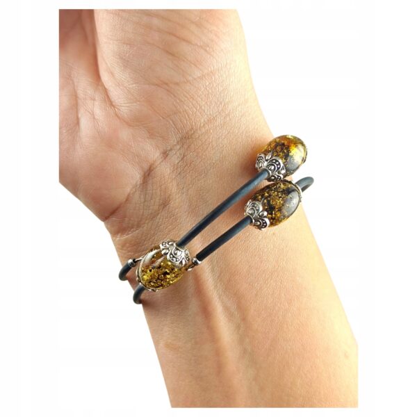 d0e23195f62ad536f4e58a37da00b881.jpg Bransoletka srebrna ze stali z certyfikowanym bursztynem - regulowana