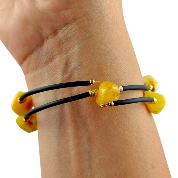 d2ee01f88220fb6418cbfeff99fdec42.jpg Bransoletka złota ze stali z certyfikowanym bursztynem - regulowana