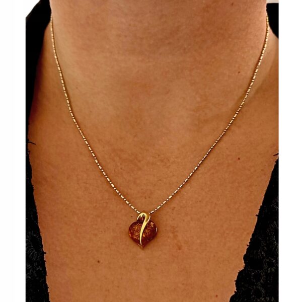 db08872e1f9be3032d073cbbbce4349d.jpg Wisiorek złoty serce serduszko z bursztynem - Srebro pozłacane 925