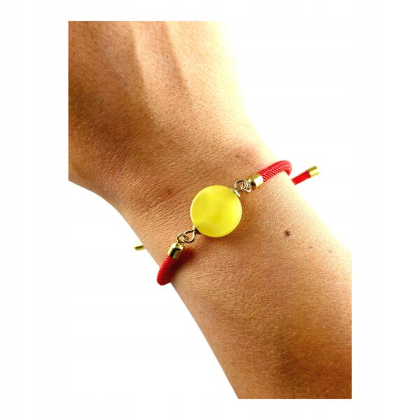 f7f94540e22725618849abc4902efb90.jpg Bransoletka na sznurku z naturalnym mlecznym bursztynem - regulowana