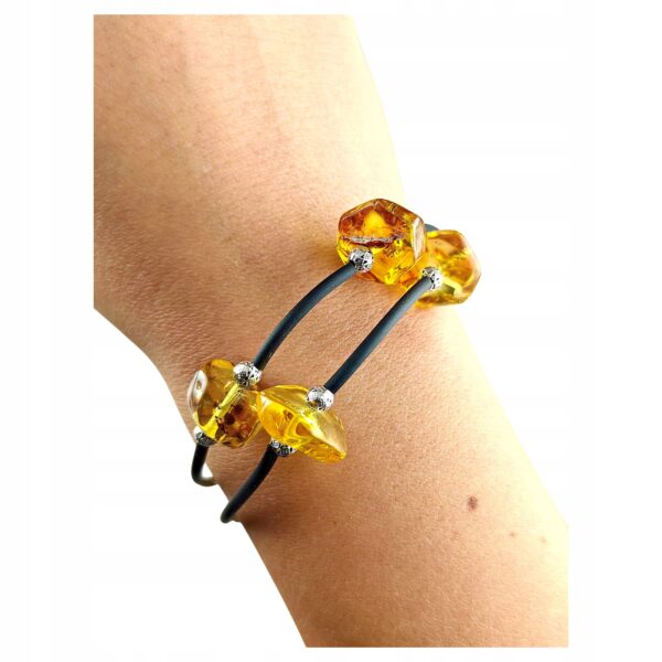 ffbe5db47f3cb4559aeb955bf17ec26b.jpg Bransoletka srebrna ze stali z certyfikowanym bursztynem - regulowana