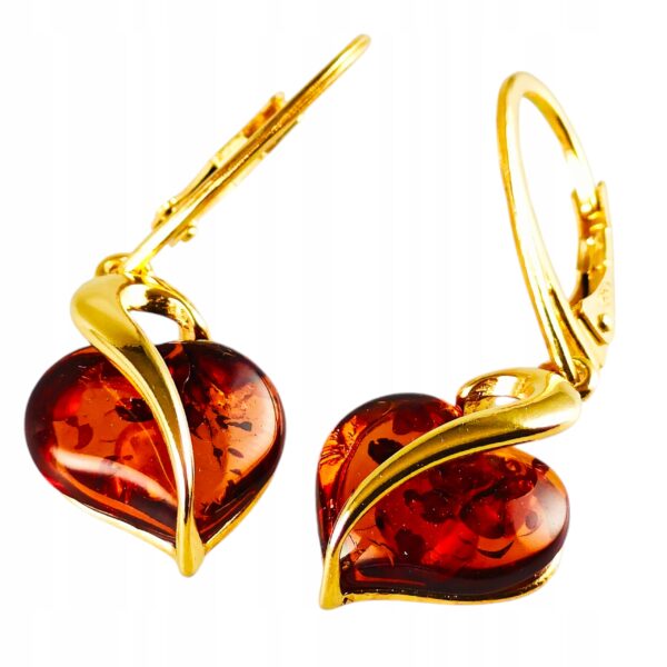 38b92ab57558dd8c6b7b8f9576fe7fc7.jpg Kolczyki srebrne pozłacane serduszka z bursztynem - wiszące