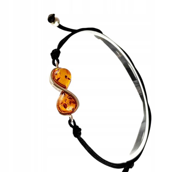3b348af2080aa0aa7717bd911e1b5a4c.jpg BRANSOLETKA SREBRNA na Sznurku NIESKOŃCZONOŚĆ z CERTYFIKOWANYM Bursztynem