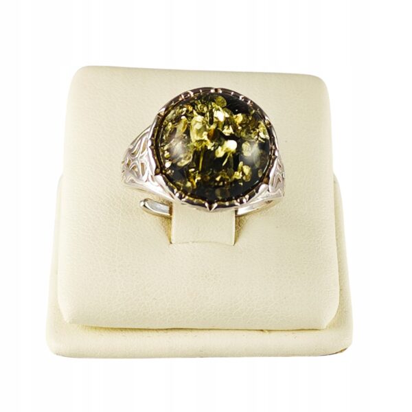 Pierścionek srebrny z bursztynem - okrągły z ażurowym zdobieniem