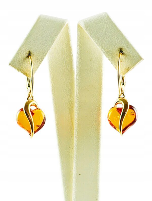 67a65544867cdba3c10136768b8be7a2.jpg Kolczyki srebrne pozłacane serduszka z bursztynem - wiszące