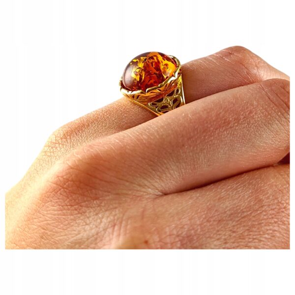 ab26fe418317835f54e7655c0b08eae1.jpg PIERŚCIONEK ZŁOTY REGULOWANY z CERTYFIKOWANYM BURSZTYNEM Srebro Pozłacane