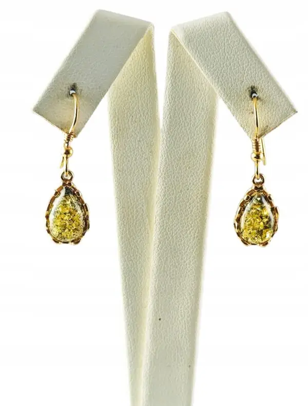 Kolczyki złote z bursztynem z koronkowym zdobieniem - srebro pozłacane