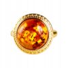 Pierścionek srebrny pozłacany z bursztynem - okrągły