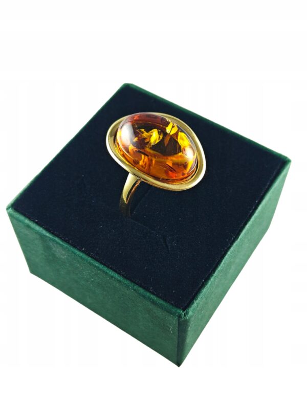 Pierścionek srebrny pozłacany z bursztynem - owalny klasyczny