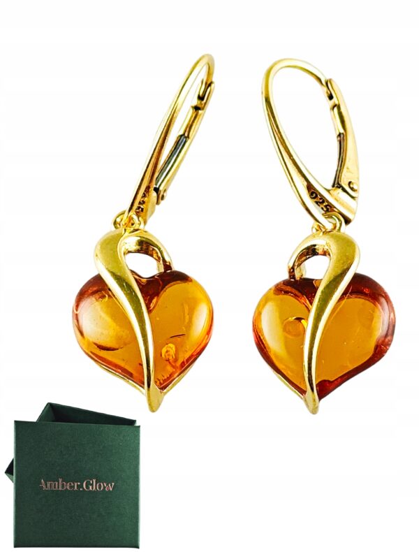 d6bd6e286c32cee2c37ea7eff631b237.jpg Kolczyki srebrne pozłacane serduszka z bursztynem - wiszące