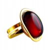 Pierścionek złoty regulowany z wiśniowym bursztynem - owalny klasyczny - srebro pozłacane