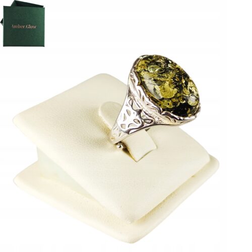 Pierścionek srebrny z bursztynem - owalny z ażurowym zdobieniem