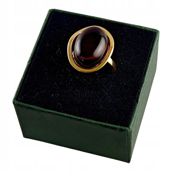 Pierścionek złoty regulowany z wiśniowym bursztynem - owalny klasyczny - srebro pozłacane