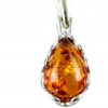 Wisiorek srebrny z koniakowym bursztynem - koronkowy