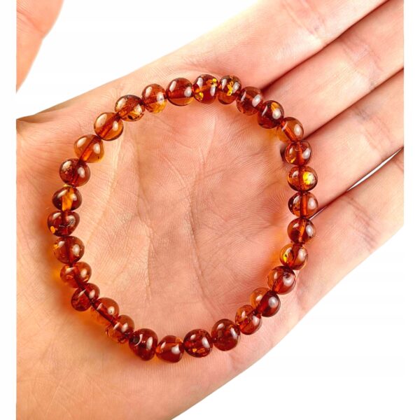 b8997d908c8049d5cd6856c61e178201.jpg BRANSOLETKA z CERTYFIKOWANYM BURSZTYNEM Naturalna na Gumce Piękna ŚLICZNA