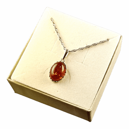 f859bc88e5f5562e7b60f224589374b5-1.png Wisiorek srebrny z koniakowym bursztynem - koronkowy