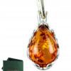 Wisiorek srebrny z koniakowym bursztynem - koronkowy