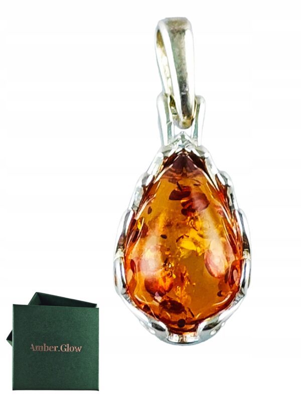 Wisiorek srebrny z koniakowym bursztynem - koronkowy