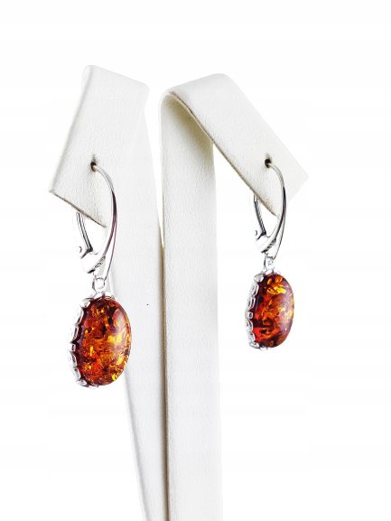 c0ca9bbc519dbb7011197b0e2da54f34.jpg Kolczyki srebrne z bursztynem - wiszące