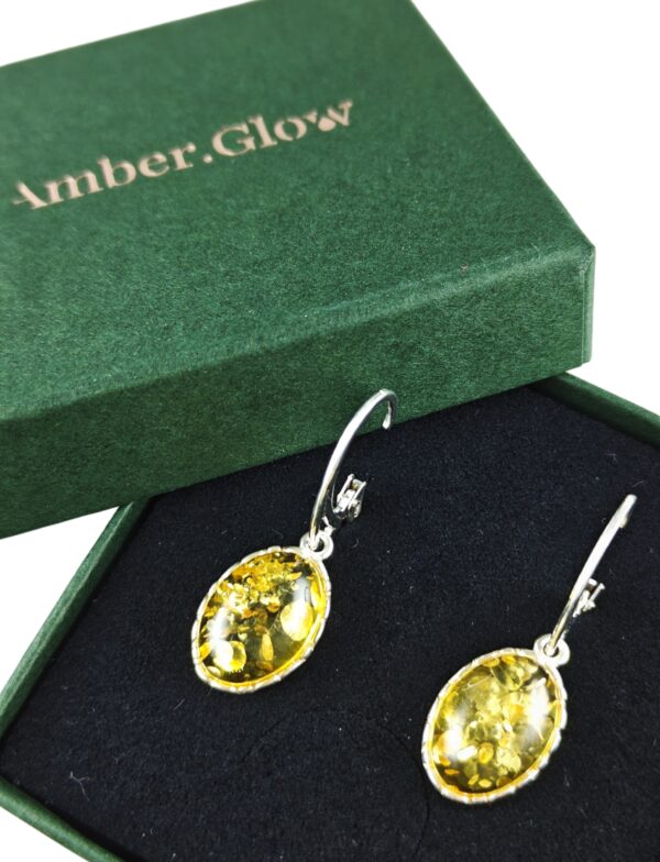 f941c8e2a7df8d194fdeefaafd6d2d74.jpg Kolczyki srebrne z bursztynem - wiszące