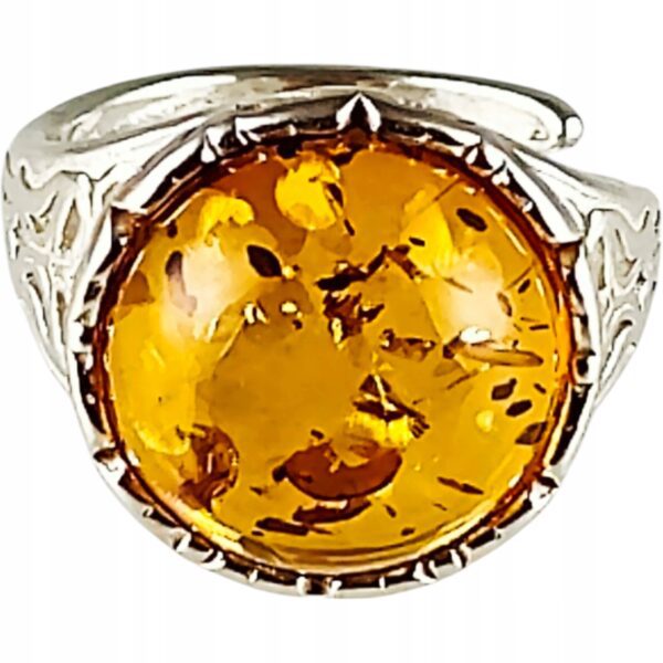 Pierścionek srebrny z bursztynem - okrągły z ażurowym zdobieniem