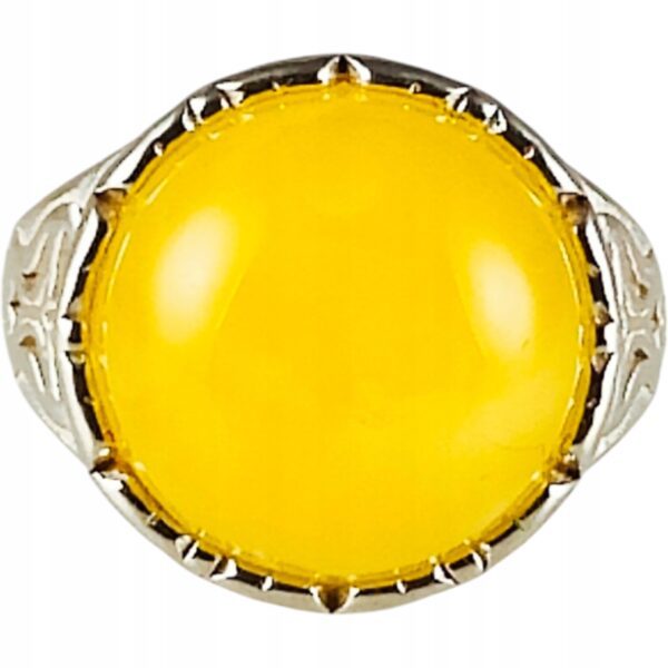 Pierścionek srebrny z bursztynem - okrągły z ażurowym zdobieniem