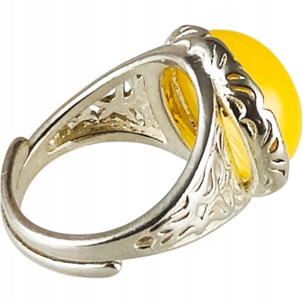 Pierścionek srebrny z bursztynem - okrągły z ażurowym zdobieniem