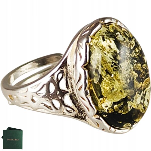 Pierścionek srebrny z bursztynem - owalny z ażurowym zdobieniem